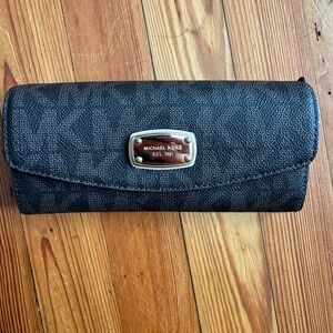 Michael Kors wallet. Classic brown with MK logo, great shape.
